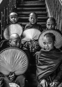 a group of child monk in a bouddist temple in Myanmar